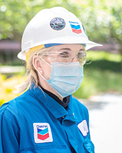 Chevron worker wearing PPE mask