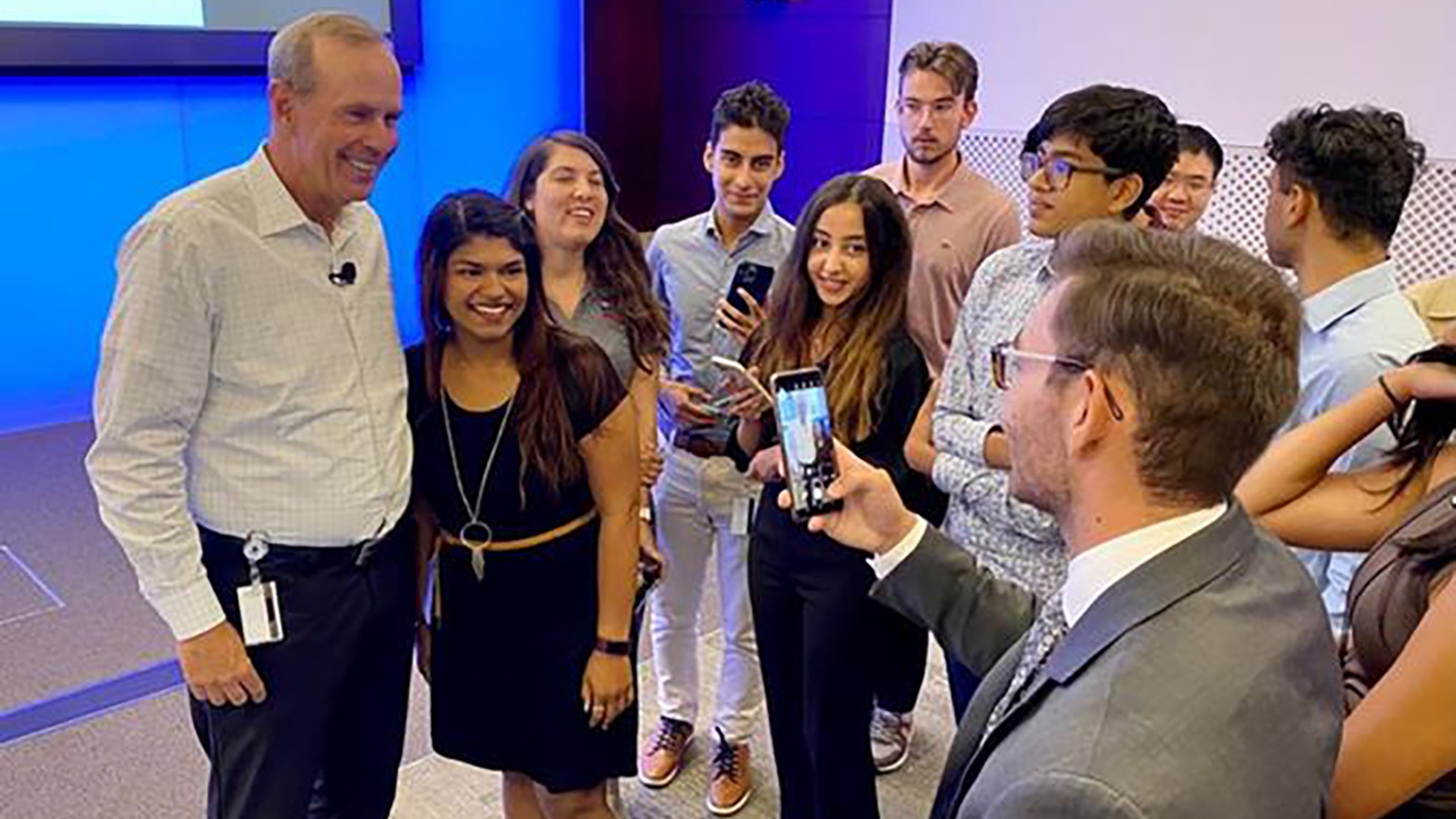 Summer interns meet and greet Chevron Chairman and CEO Mike Wirth during the 2022 Global Intern Town Hall.
