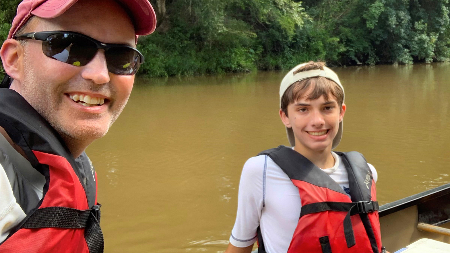 Sean Barnes, president of Chevron’s ENABLED employee network, enjoys a day on the river with his son, Mason.