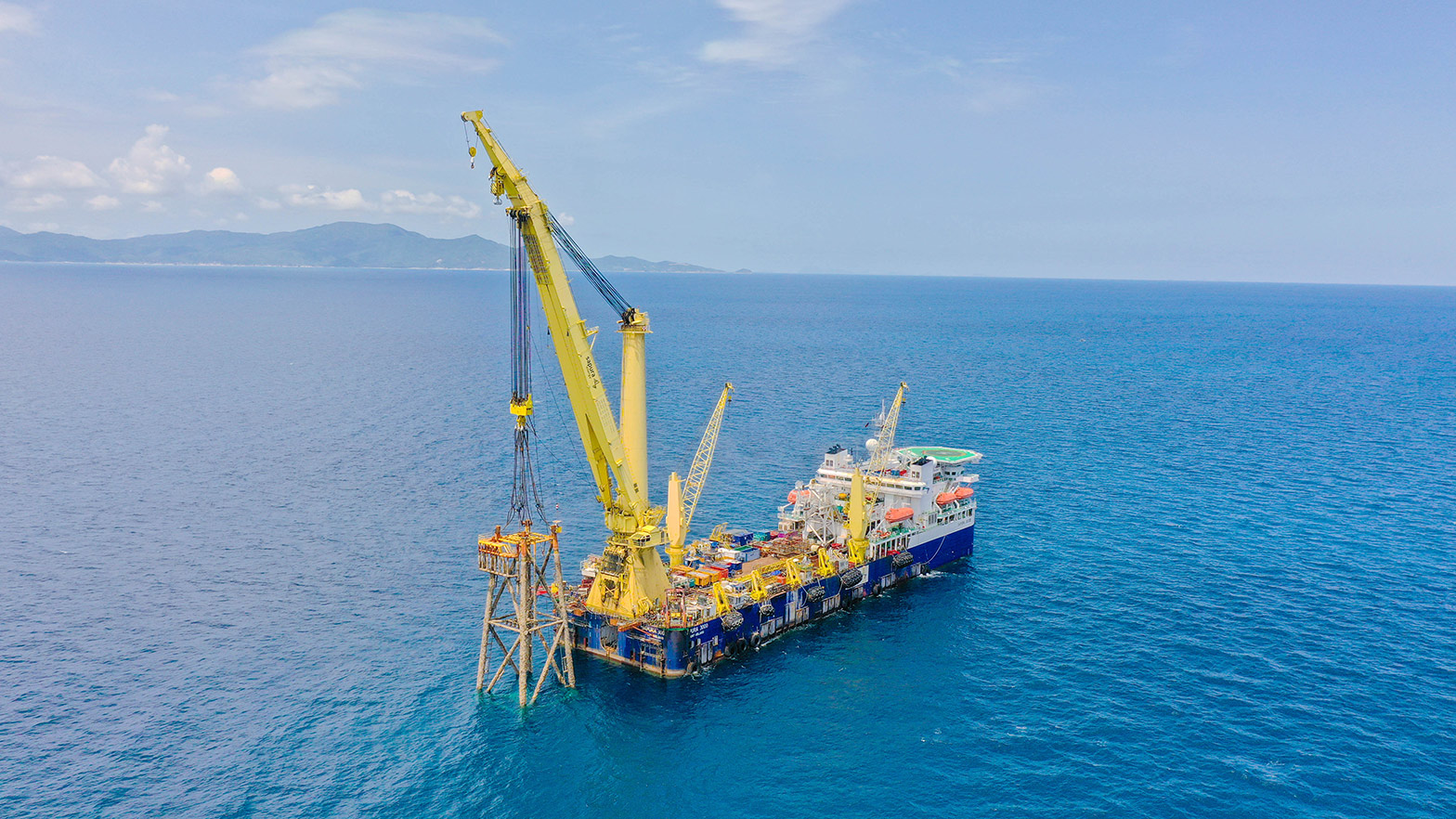 A platform jacket in the Gulf of Thailand is pictured being towed to the reef site