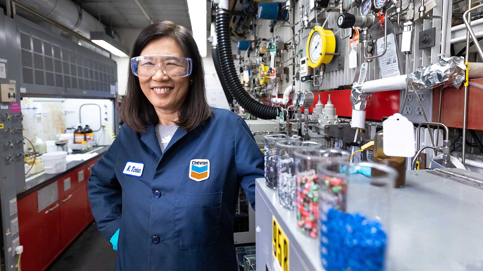 hye-kyung timken: principal scientist, chevron technical center, next to beakers