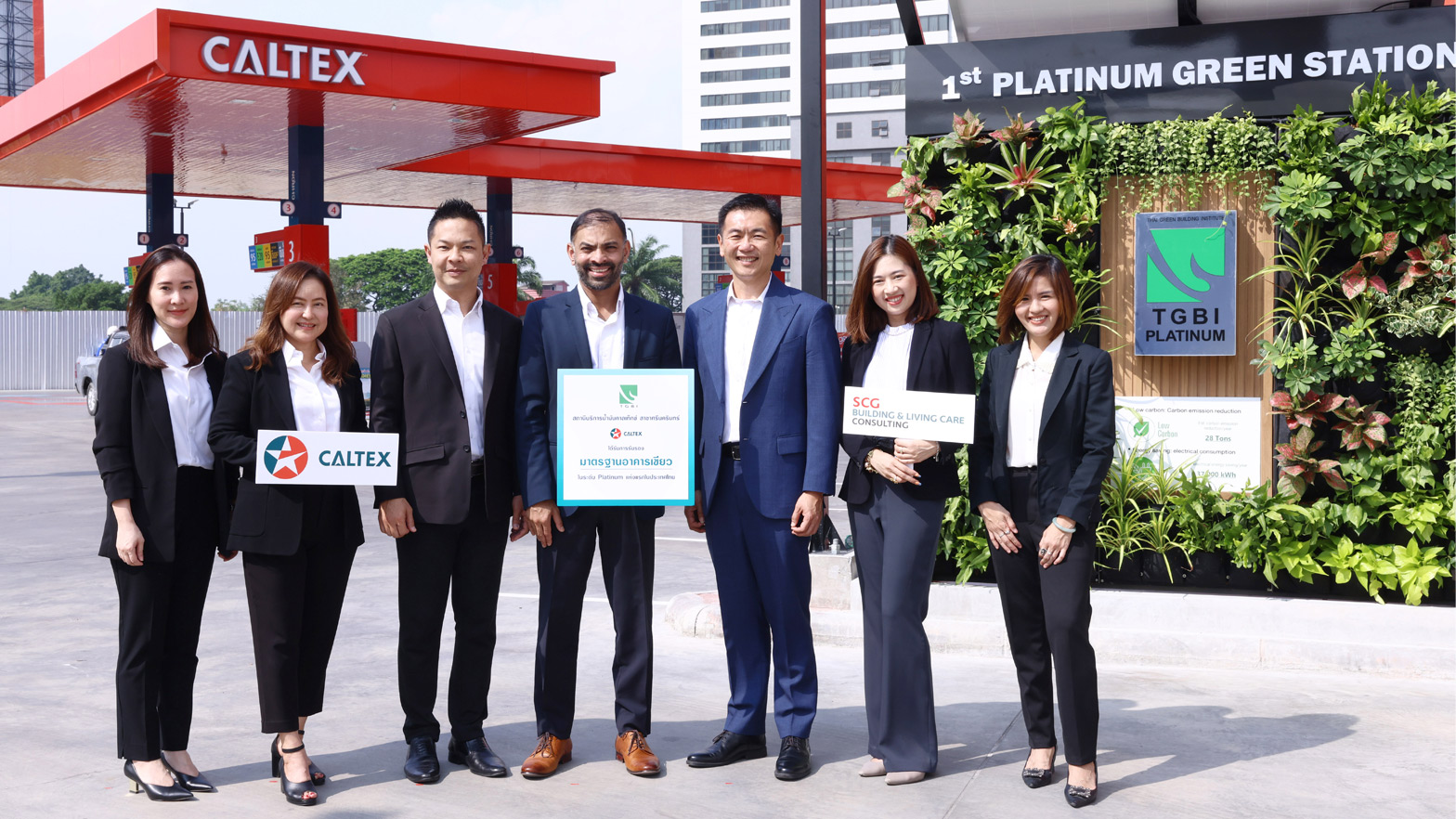 The Caltex Srinakarin service station team displays their Platinum Level Green Building certification.