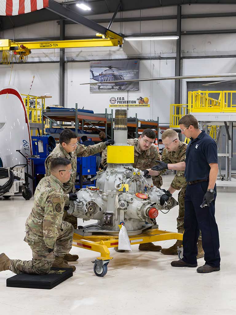Air Force members are observing Chevron perform inspections and maintenance before the new fleet arrives next spring.
