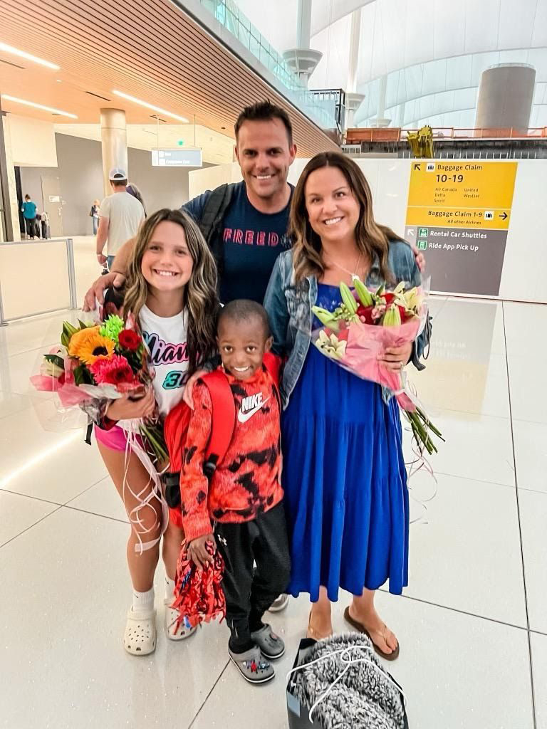 Antonio family welcomes Wilguens with flowers