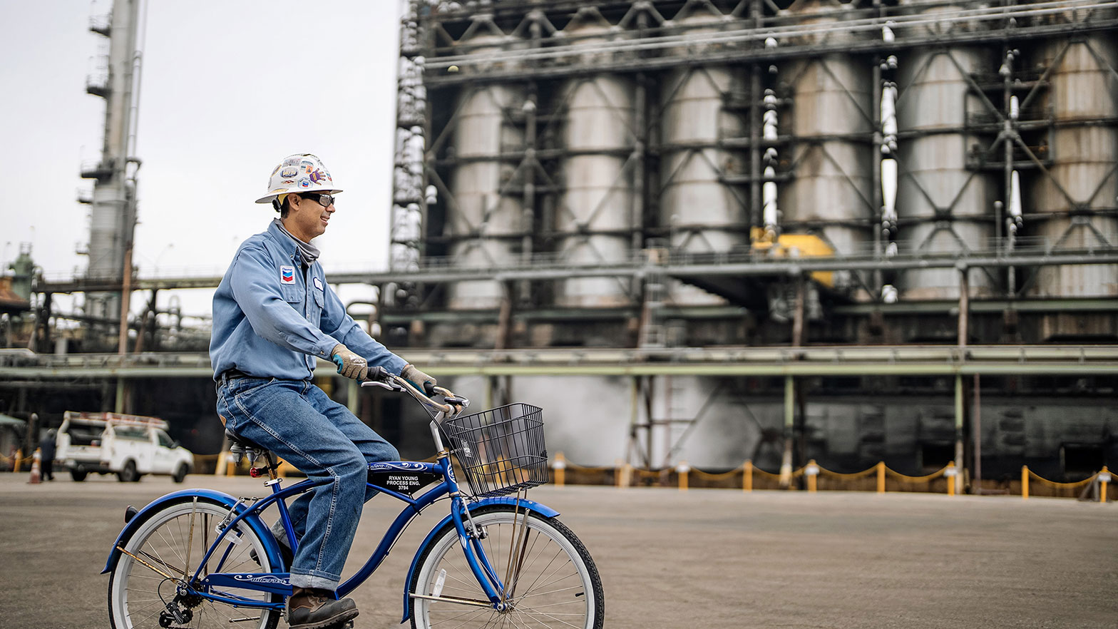 Trucks aren’t the only mode of transportation at the El Segundo, CA, refinery, as the smiling worker above demonstrates.