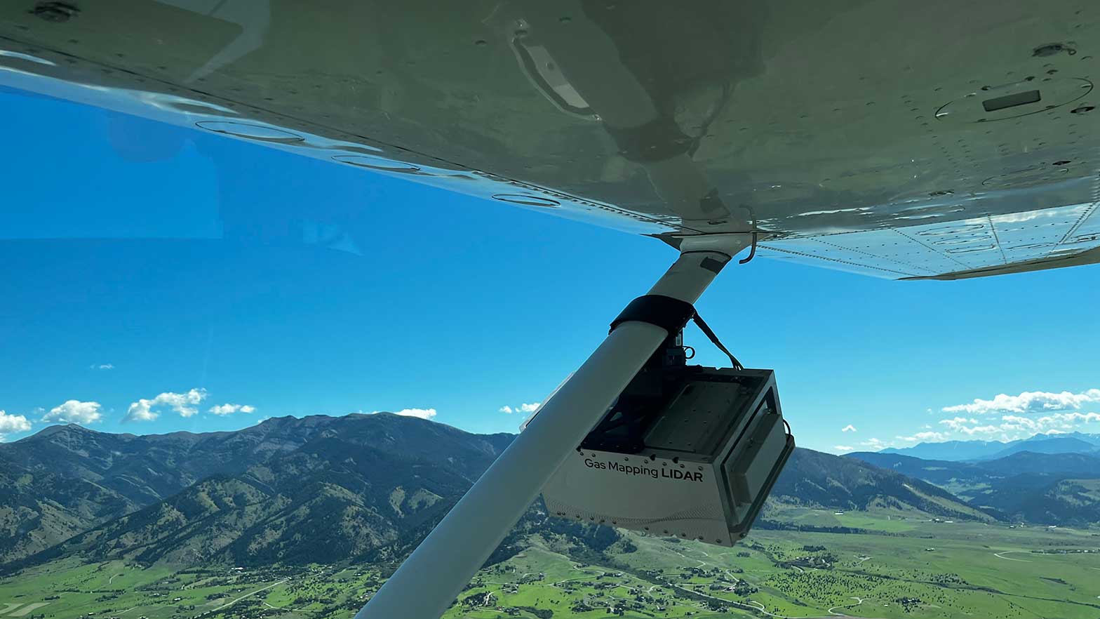 Aircraft-based solutions like Bridger Photonics (pictured) help us and nearby operators cost-effectively screen assets for methane emissions across a wide geographic footprint.