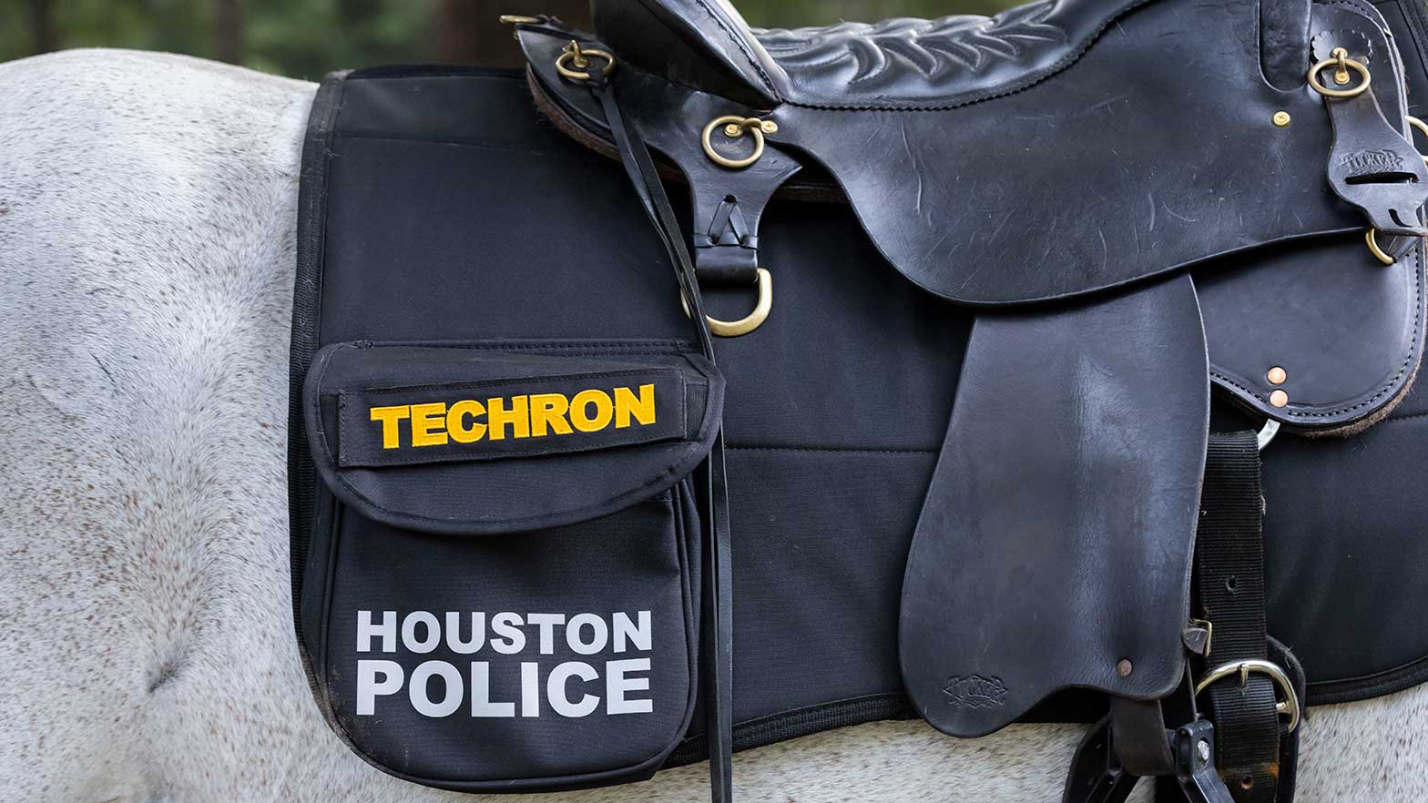 a saddle marked with Techron, Houston Police