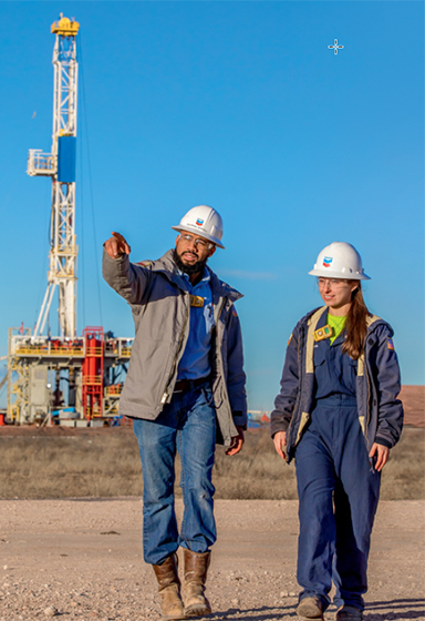 Chevron workers at the Permian Basin oil rig site.