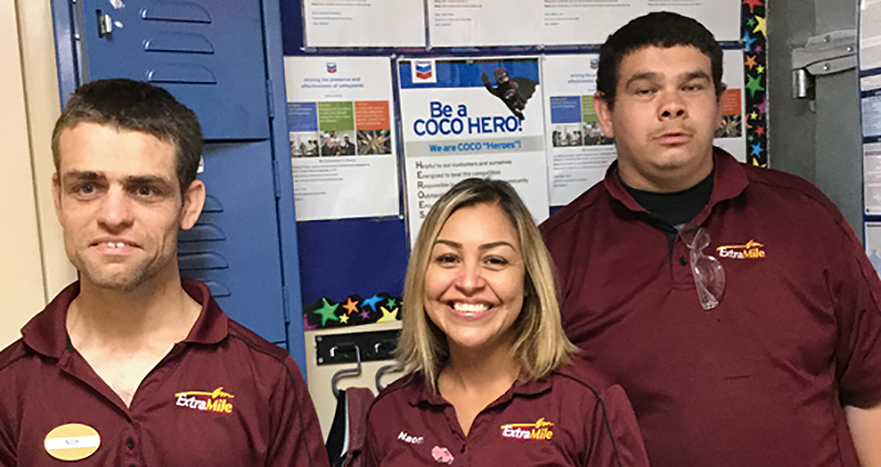 Chevron Service Station Manager Naomi Mata with new employees, Carter Chavez and Nicholas van Wingerden.